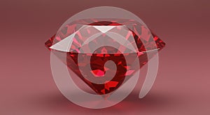 Close up of a faceted red ruby gemstone on a pink surface