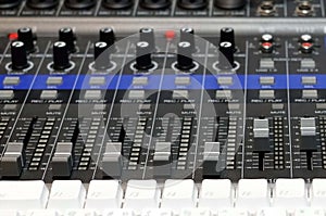 Close-up of the fader of a mixer in the reccordding room