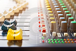 Close up Faders of sound mixer Volume adjusting knobs controller in control room