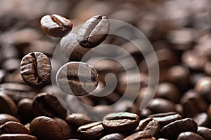 Close up of falling coffee beans