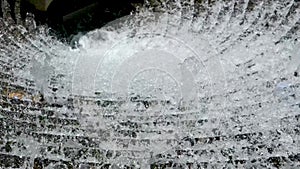 Close-up of falling crystal water. Slow motion