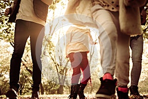 Close up of family legs in park.