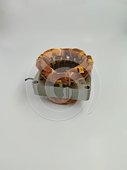 close up fan dynamo winding coil on a white background photo