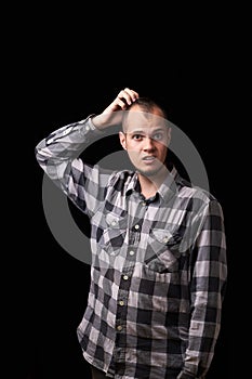 Close up Fashion Shot of a Young Man A trendy European man dressed in contemporary cloth. Portrait of a nice guy