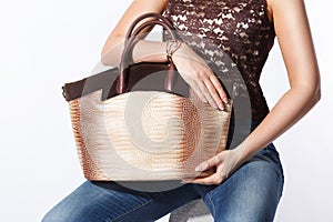 Close-up of a fashionable golden bag