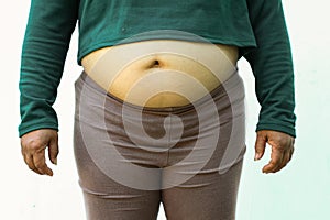 Close-up of fat woman on white background. Concept for obesity issue, diet of food for health