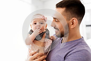 Close up of father little baby girl at home