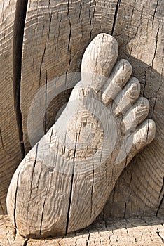 Close - up of feet carved from wood