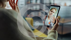 Close Up of a Female Chatting in a Video Call with Her Handsome Caucasian Male Friend on Smartphone