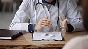 Close up of female doctor consult patient in hospital