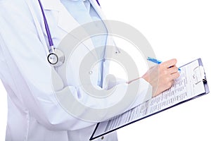 Close up of a female doctor filling up medical history form, just hands