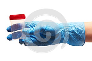 Close up of female doctor's hand in blue sterilized surgical glove holding empty transparent plastic sterile specimen collection c