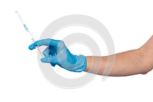 Close up of female doctor`s hand in blue sterilized surgical glove with plastic medical syringe white background