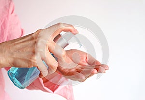 Close Up of Female Hand Pressing Alcohol Hand Rubbing Gel for Hand Hygiene