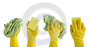 Close up of female hand in yellow protective rubber glove holding green cleaning sponge against and cloth to wipe.
