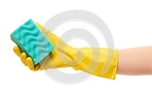 Close up of female hand in yellow protective rubber glove holding green cleaning sponge