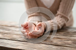 Close up of female hands being held together