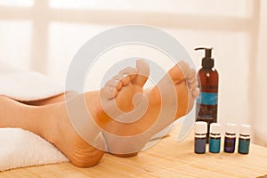 Close-up of female hands doing foot massage