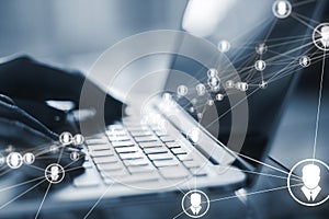 Close up of female hands using laptop on desk with glowing video conference hologram and polygonal connections on blurry