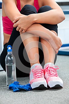 Close-up of female legs in the gym.