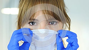 Close Up of Female Reseach Scientist, Doctor Wearing Mask