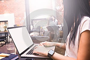 Close up female skilled freelance worker keyboarding on pc laptop computer