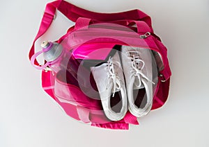 Close up of female sports stuff in backpack