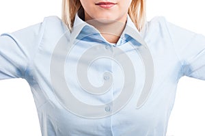 Close-up of female wearing shirt showing sweat stains