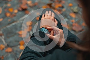 Close-up of female wearing in smart watch application. photo