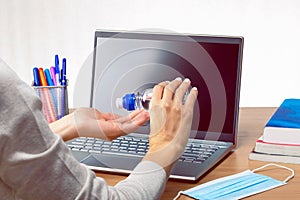 Close up of female worker sit in office clean hands use sanitizer