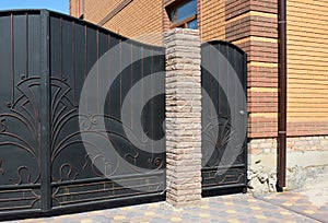 Close up on fence door installation and metal fence gate.