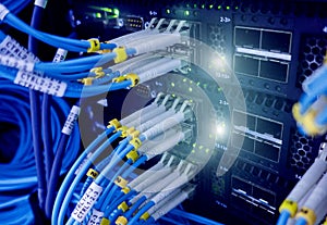 Close up fiber optic cable. Servers racks