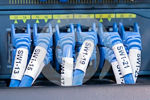 Close up fiber optic in server room .