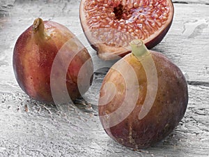 Close-up of figs on dark stone background