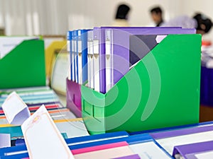 Close up file folder containing files and documents in office of assessment