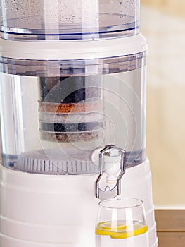 Close up of a filter system of water purifier on a kitchen background