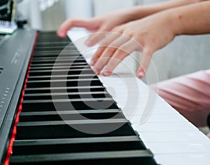 Close-up Finger playing piano keyboard