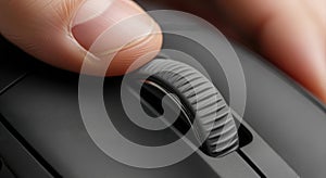 Close-up of Finger Scrolling on Computer Mouse Wheel