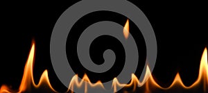 Close up fire flames isolated on black background
