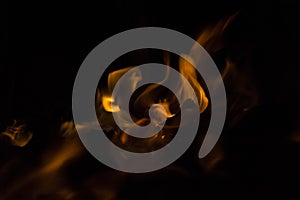 close-up: fire flames in the outdoors grill box for barbeque