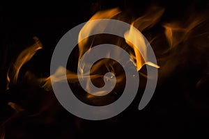 close-up: fire flames in the outdoors grill box for barbeque