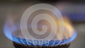 Close-up of a fire in a gas stoker on a gas stove