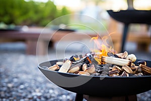 close-up of fire pits hot coals and crackling wood