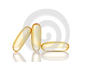 Close-up on fish oil capsule, contains omega-3 polyunsaturated acid EPA and DHA that enhances heart and health