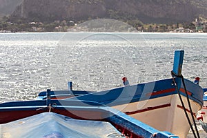 close-up of a fishing boat beached at the sea