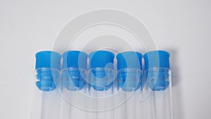 Close up of Five Empty test tubes on white background