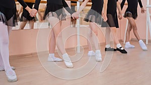 Close-up of five little girls& x27; feet and ballet class.