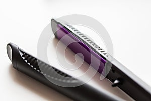 Close up of flat hair straightening iron