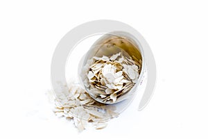 Close up of Flattened rice or beaten rice or Phoa or pava in a bowl isolated on white. photo