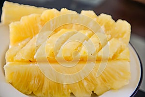 Close-up flesh of the pineapple slice.